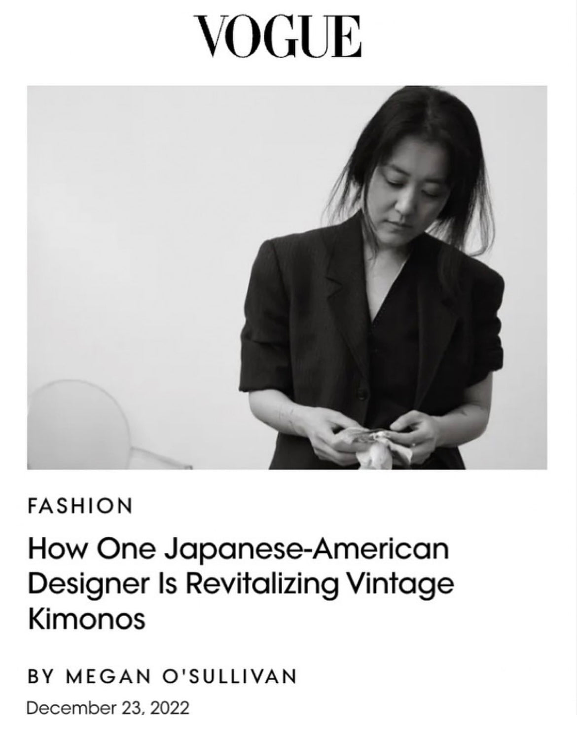 A black-and-white Vogue magazine cover or article layout featuring a woman in a dark blazer looking down while adjusting fabric, in her  Considered Objects studio with the headline 'How One Japanese-American Designer Is Revitalizing Vintage Kimonos' and the Vogue logo at the top.