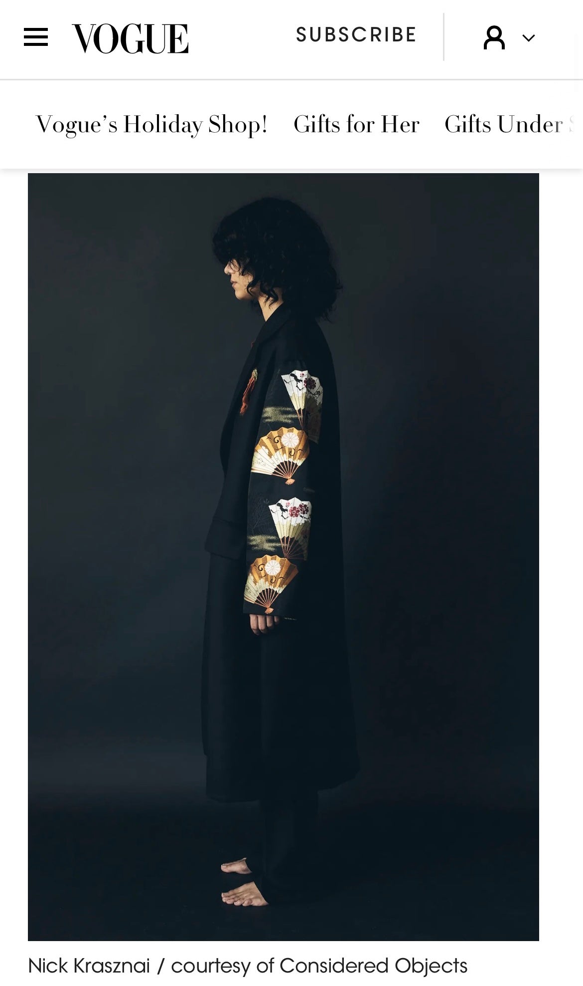 A person in profile in an Obi Coat made from an antique silk obi by Considered Objects, featured in Vogue.com